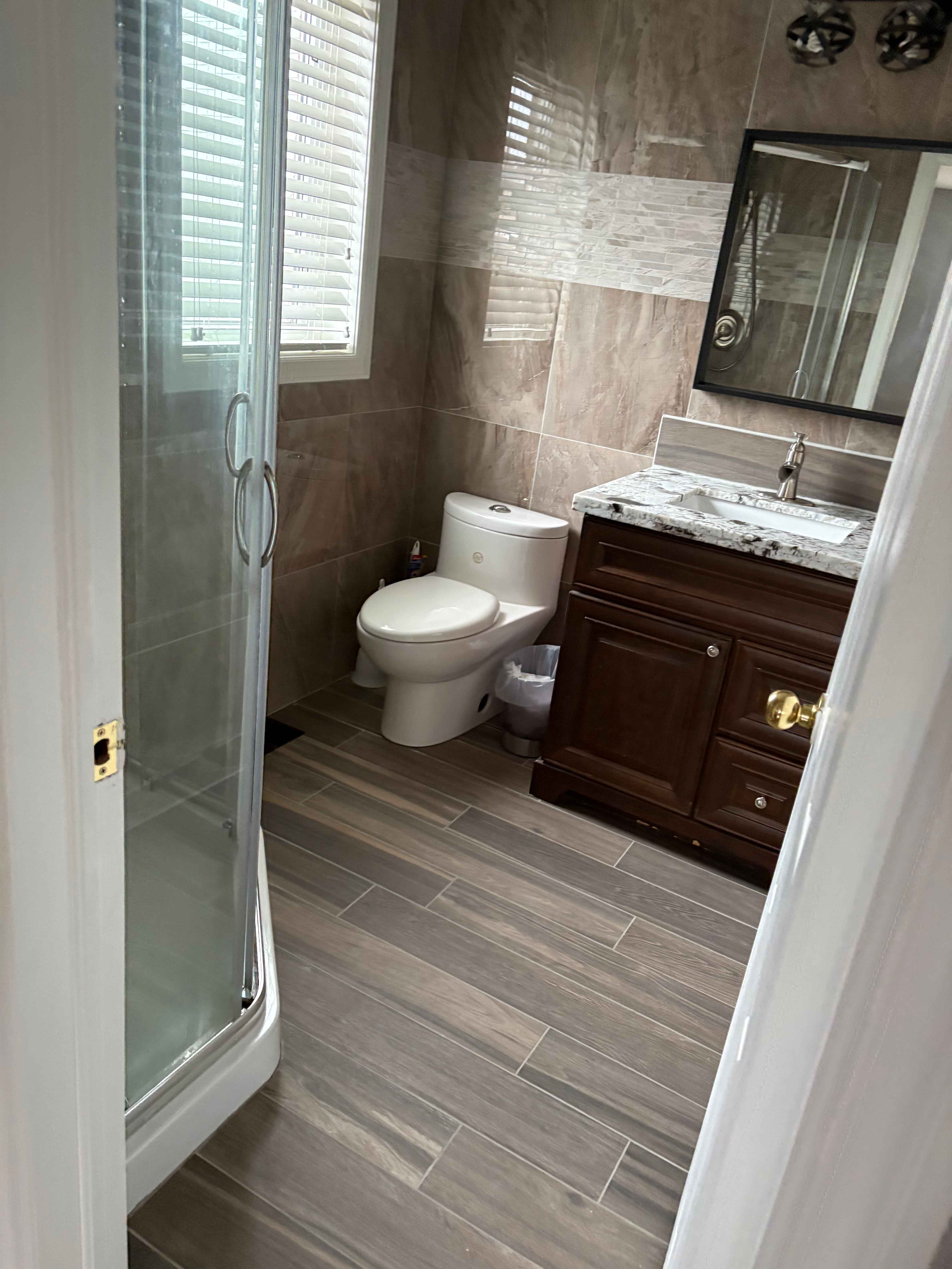 Private bedrooms with shared kitchen, laundry, and living room